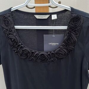 Top with embellished neckline